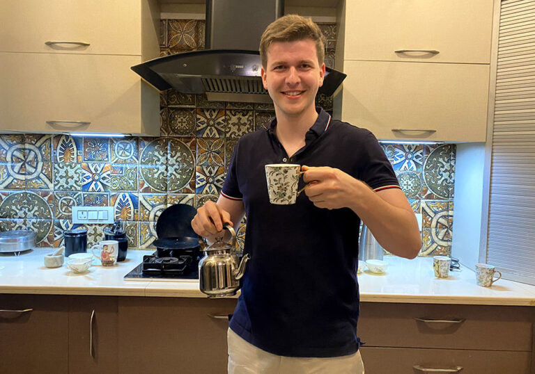 Guest drinking chai