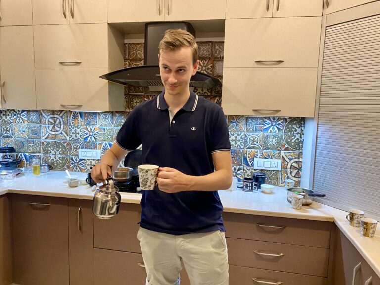 Happy guest with his chai tea